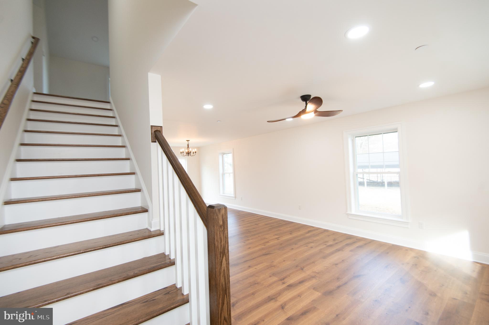 120 Academy Street Secretary, MD 21664 - Photo 4 of 46 a view of entryway and hall with wooden floor