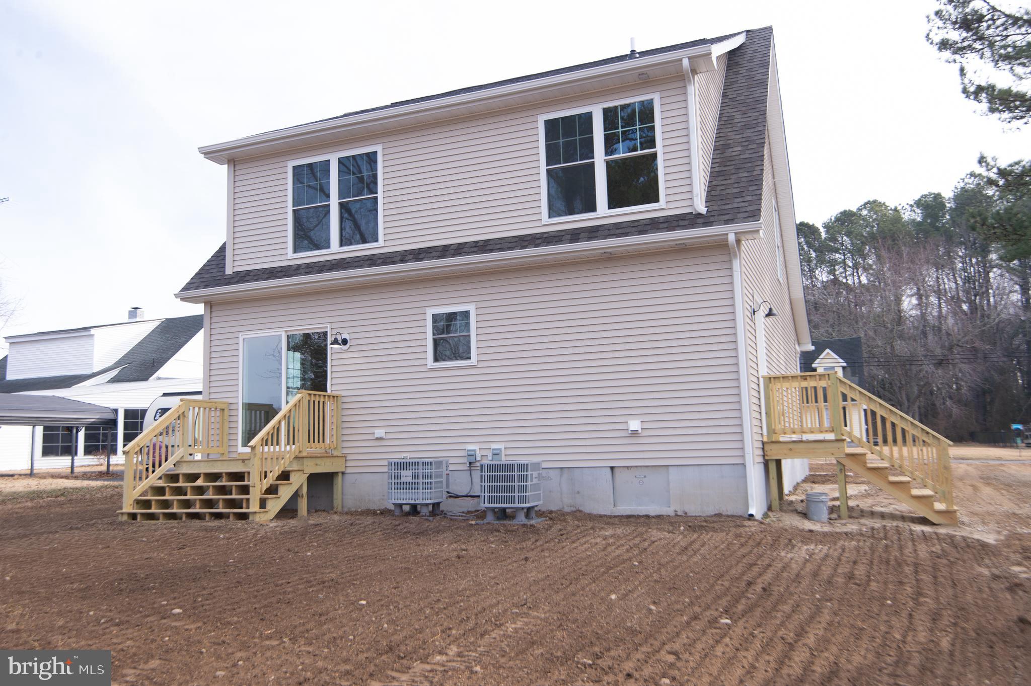 120 Academy Street Secretary, MD 21664 - Photo 41 of 46 a view of a house with a patio
