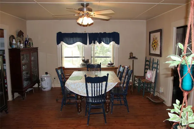 a kitchen with a refrigerator and a sink