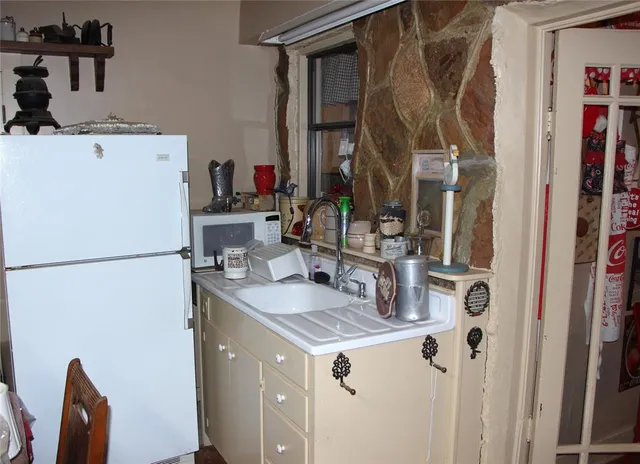 a room with a door and a mirror