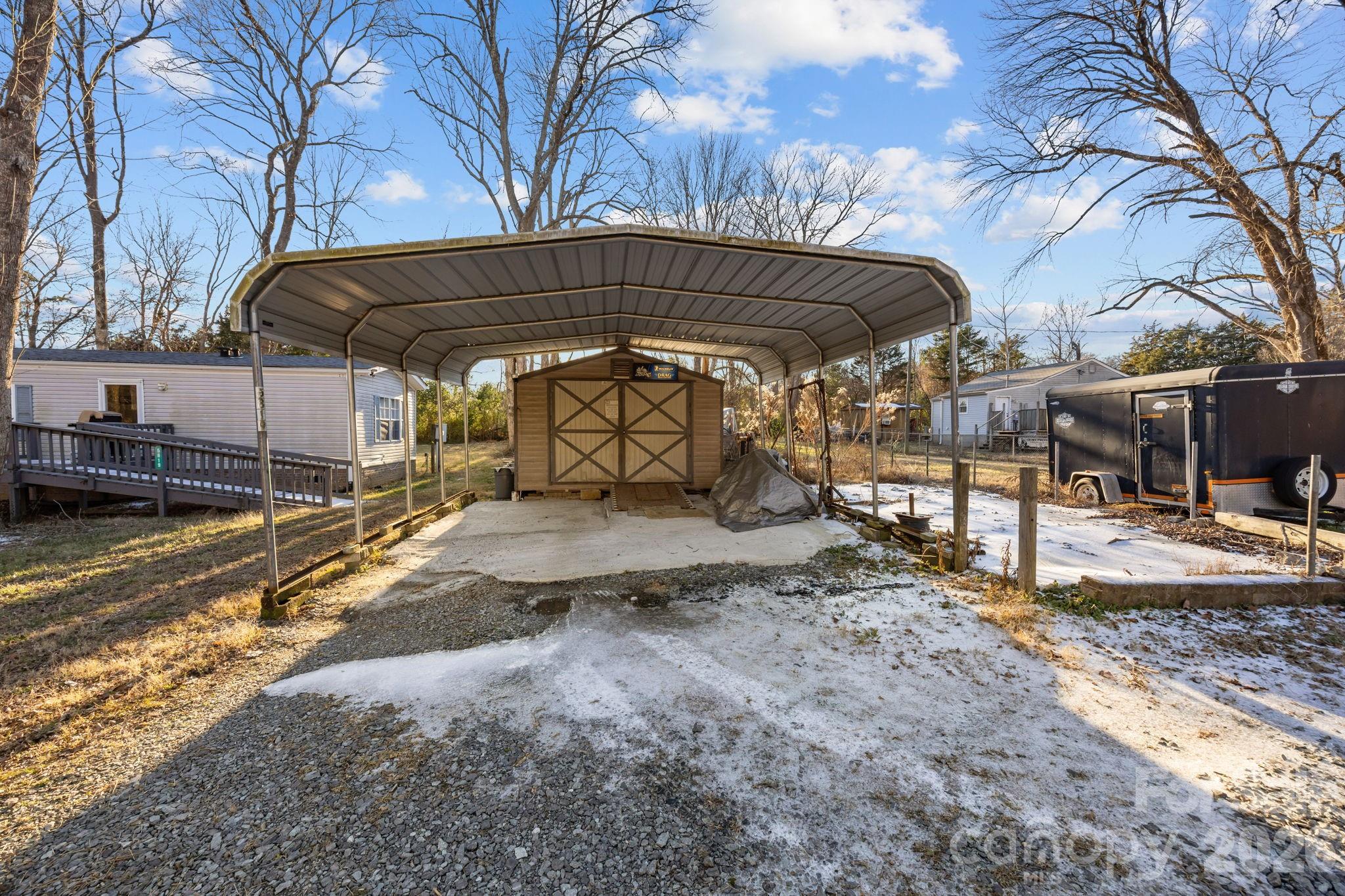 5819 Mt Gallant Road Rock Hill, SC 29732 - Photo 14 of 20 a view of a backyard with wooden fence