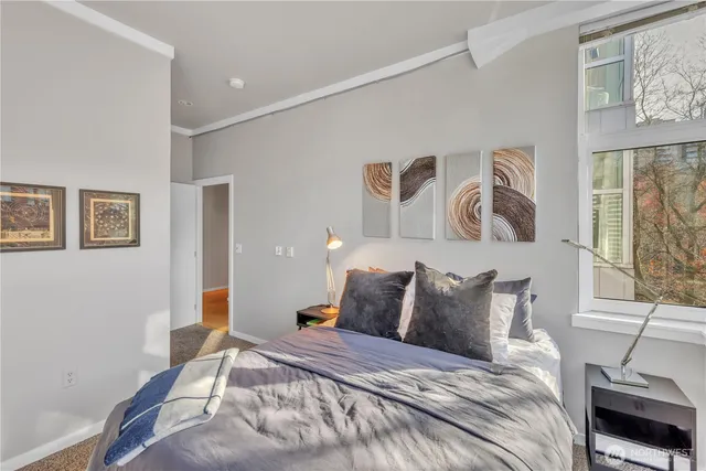 a view of a livingroom with furniture window and outside view