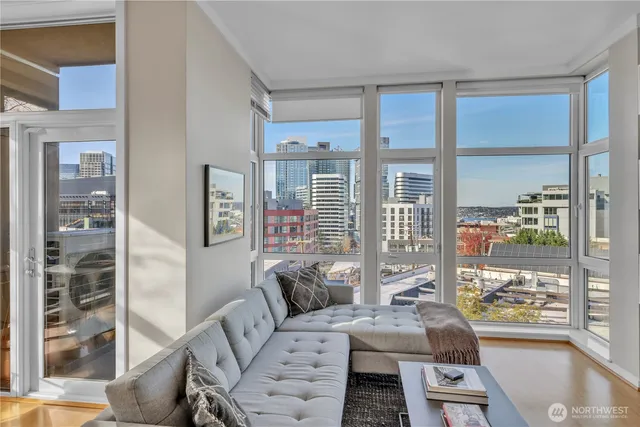 a view of a livingroom with furniture and window
