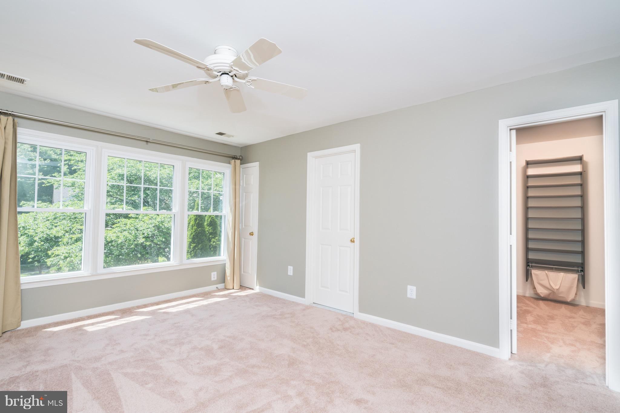 1211 Weatherstone Court Reston, VA 20194 - Photo 14 of 30 a view of an empty room with a window