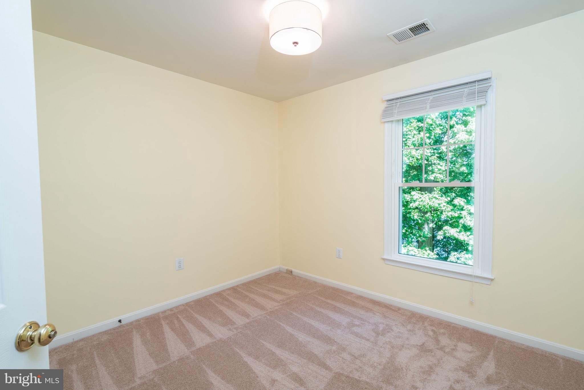 1211 Weatherstone Court Reston, VA 20194 - Photo 19 of 30 an empty room with a window