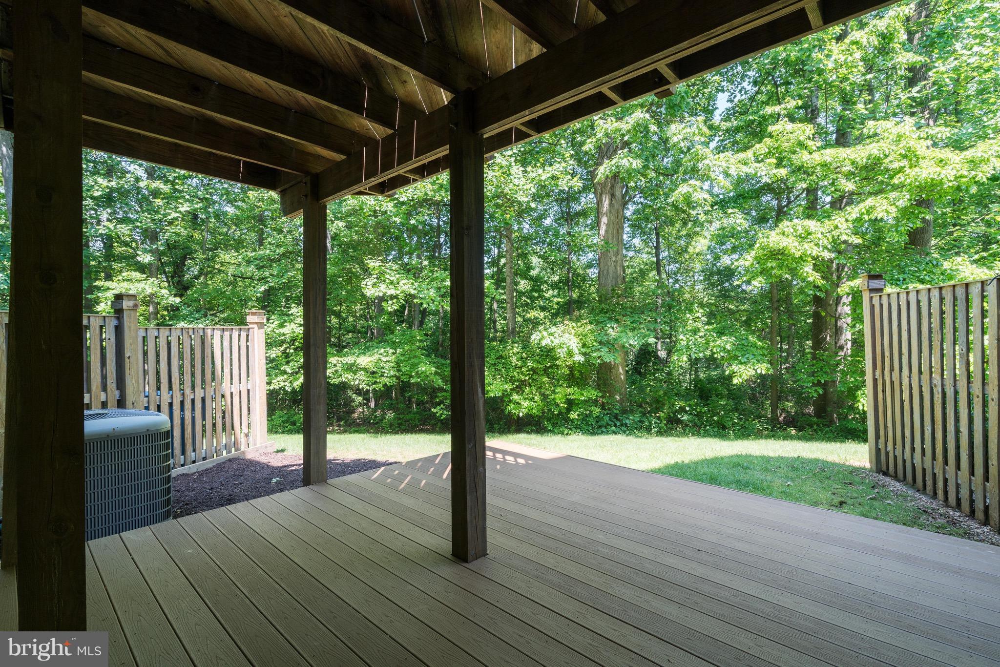 1211 Weatherstone Court Reston, VA 20194 - Photo 27 of 30 a view of a porch with wooden floor