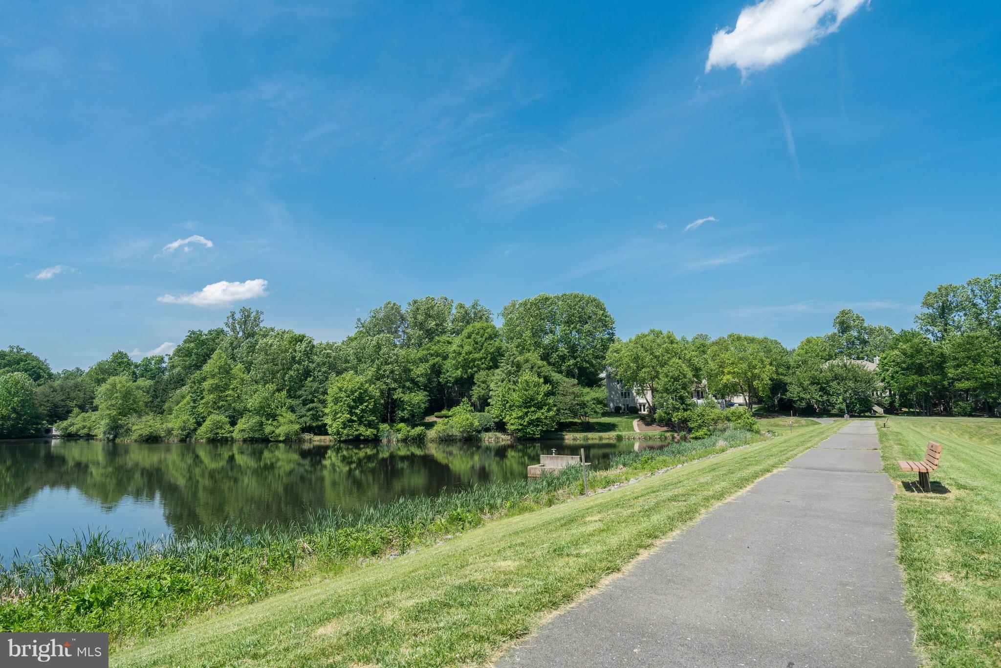 1211 Weatherstone Court Reston, VA 20194 - Photo 29 of 30 a view of a lake with a yard