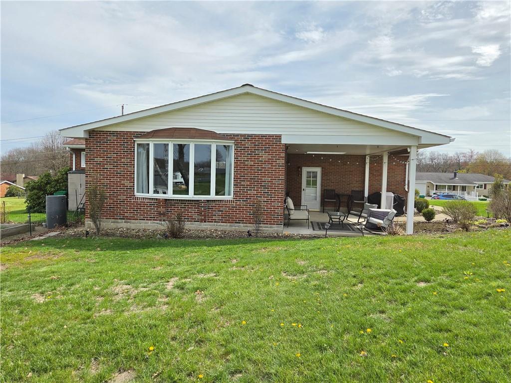 340 Westbrook Drive Butler, PA 16001 - Photo 21 of 25 a front view of house with yard and outdoor seating