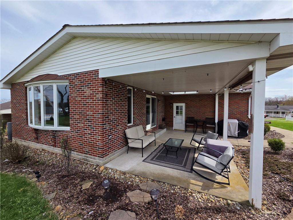 340 Westbrook Drive Butler, PA 16001 - Photo 23 of 25 a outdoor living space with patio furniture and potted plants