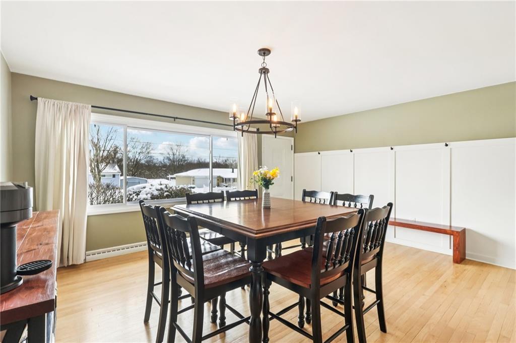 340 Westbrook Drive Butler, PA 16001 - Photo 4 of 25 a view of a dining room with furniture window and wooden floor