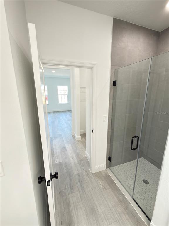 4650 Southwest 139th Place Ocala, FL 34473 - Photo 20 of 49 a bathroom with a tub and shower