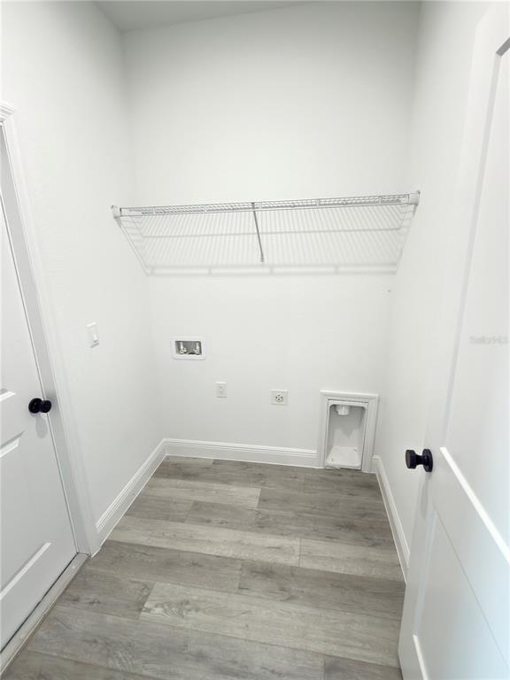 4650 Southwest 139th Place Ocala, FL 34473 - Photo 41 of 49 a view of a room with racks on the wall