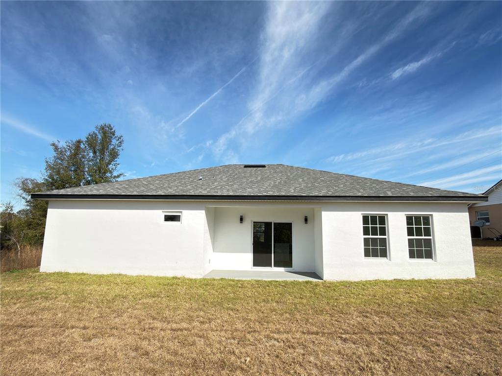 4650 Southwest 139th Place Ocala, FL 34473 - Photo 46 of 49 a view of a house with a outdoor space