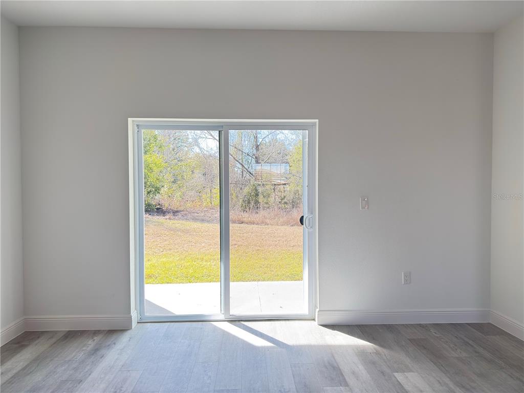 4650 Southwest 139th Place Ocala, FL 34473 - Photo 10 of 49 a view of an empty room and window