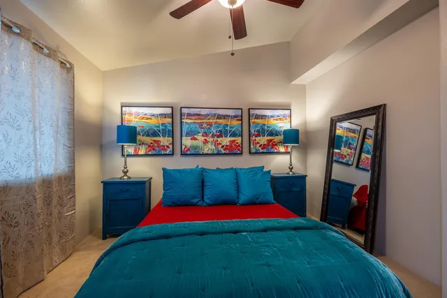 a living room with furniture and a rug