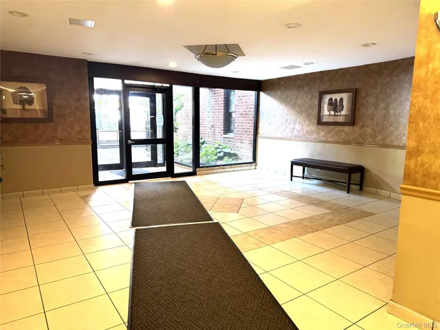 a view of swimming pool with furniture