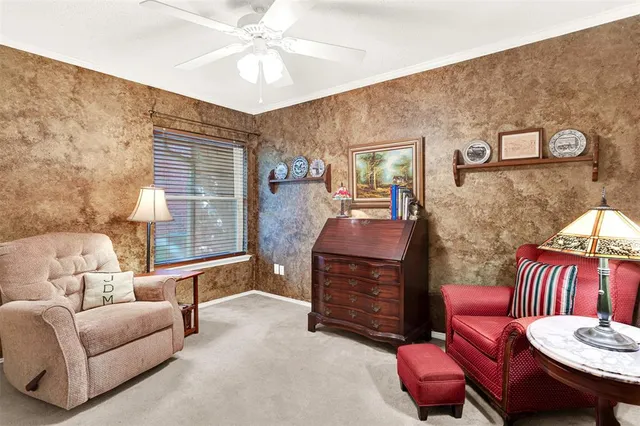 a outdoor living space with furniture and a potted plant