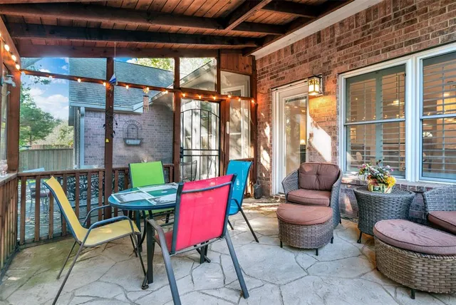 a room with furniture a window and a table