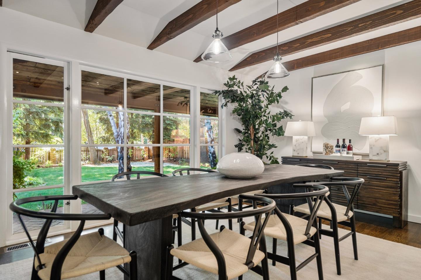 1275 Cañada Road Woodside, CA 94062 - Photo 11 of 62 a view of a table and chairs in the room