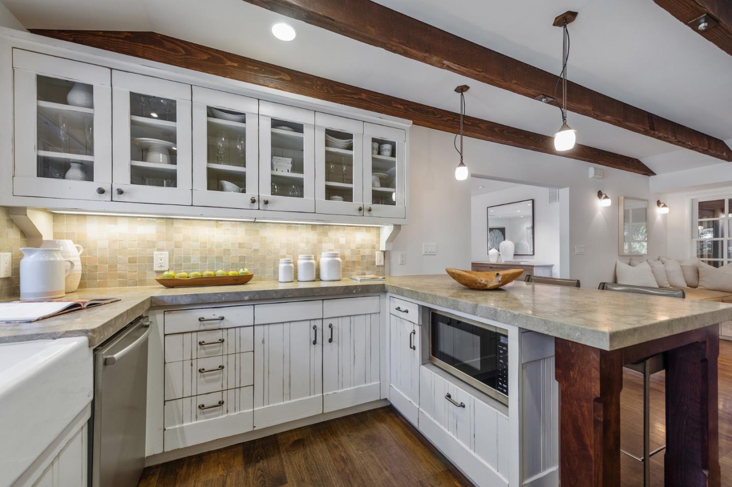 1275 Cañada Road Woodside, CA 94062 - Photo 14 of 62 a kitchen with stainless steel appliances granite countertop a stove and a sink