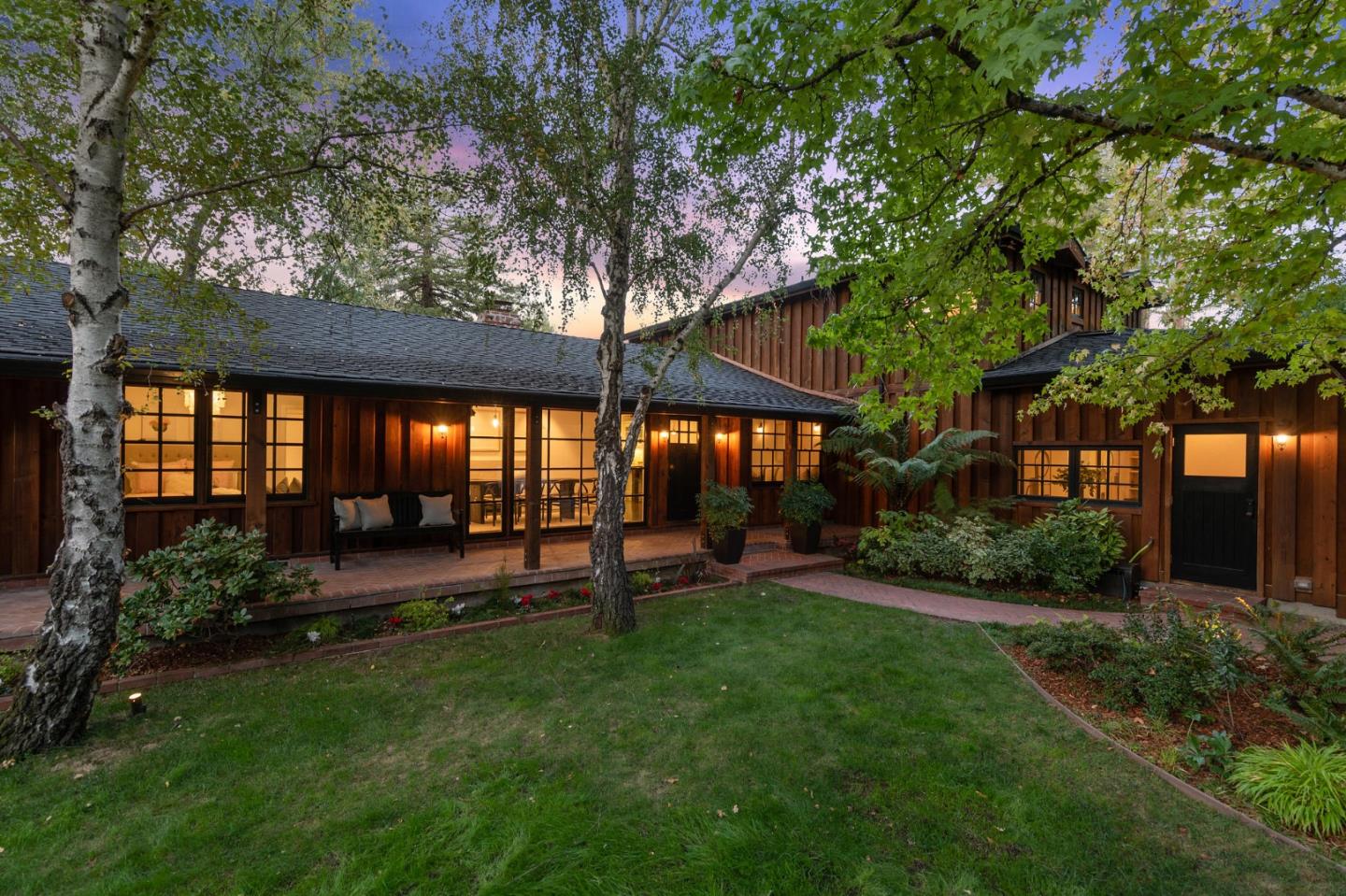 1275 Cañada Road Woodside, CA 94062 - Photo 2 of 62 a view of a house with a backyard porch and sitting area