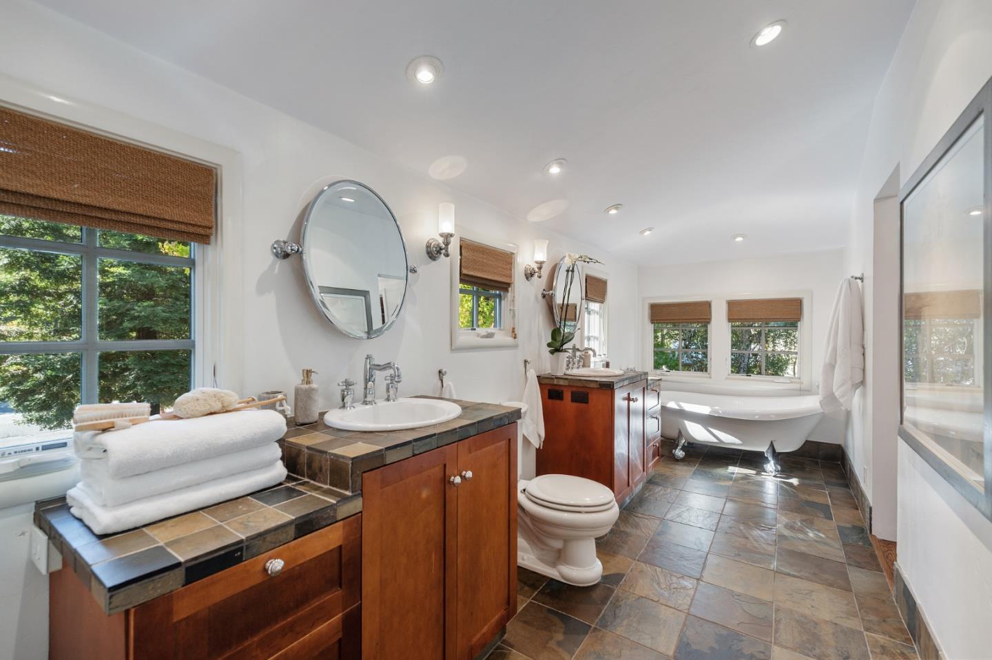 1275 Cañada Road Woodside, CA 94062 - Photo 26 of 62 a very nice looking room with a large window and a chandelier