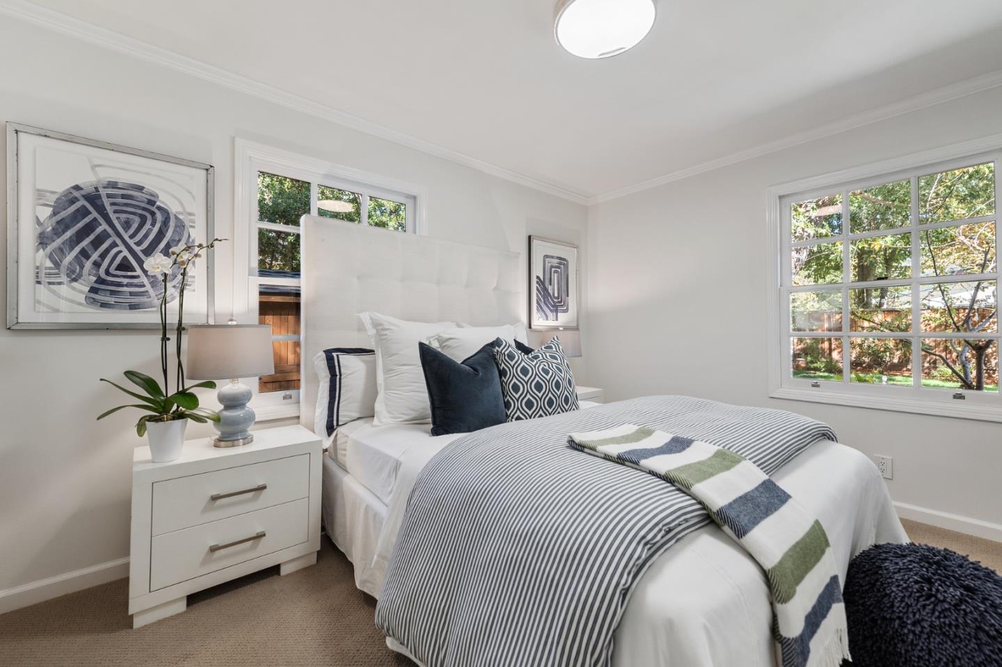 1275 Cañada Road Woodside, CA 94062 - Photo 29 of 62 a bedroom with a bed and a window