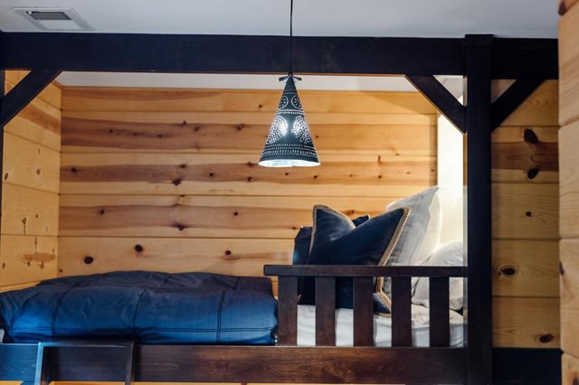 a view of a patio with a table and chairs and potted plants