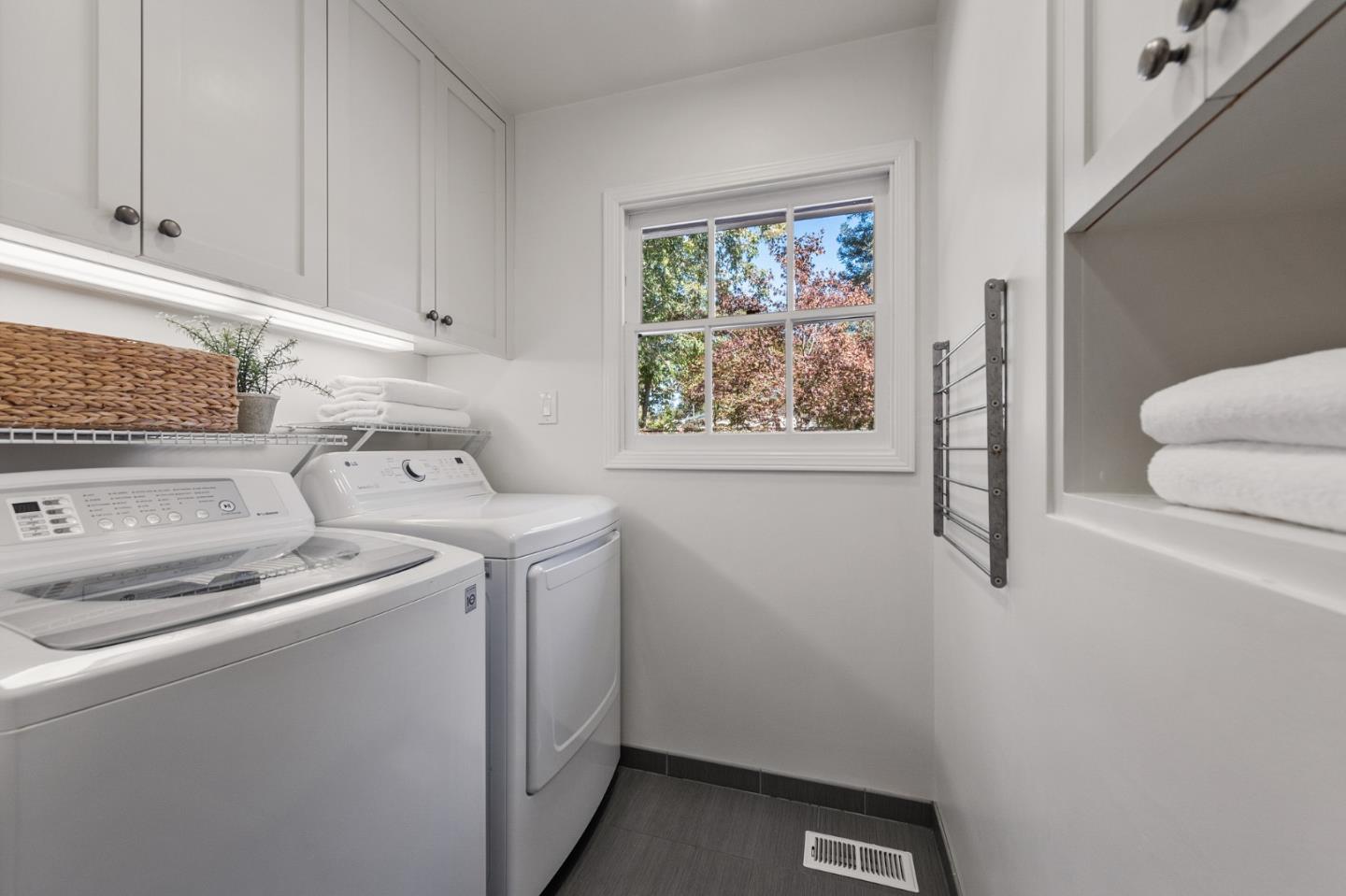 1275 Cañada Road Woodside, CA 94062 - Photo 39 of 62 a utility room with dryer and washer