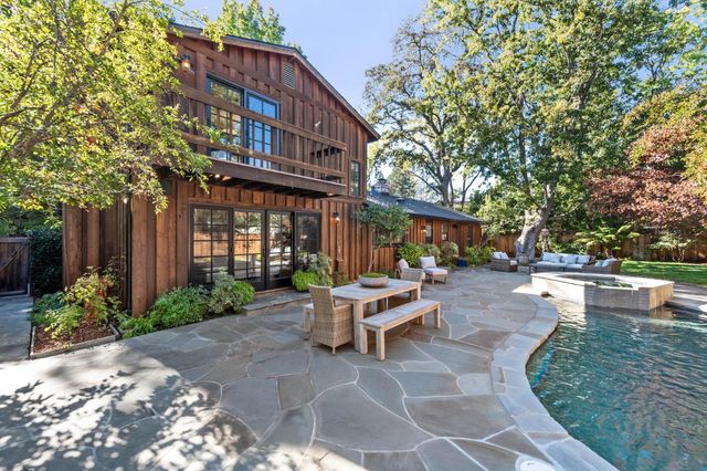 a view of a workspace with furniture