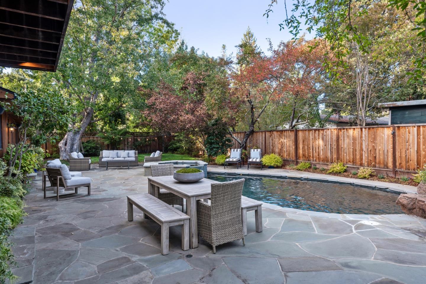 1275 Cañada Road Woodside, CA 94062 - Photo 48 of 62 a view of a backyard with sitting area