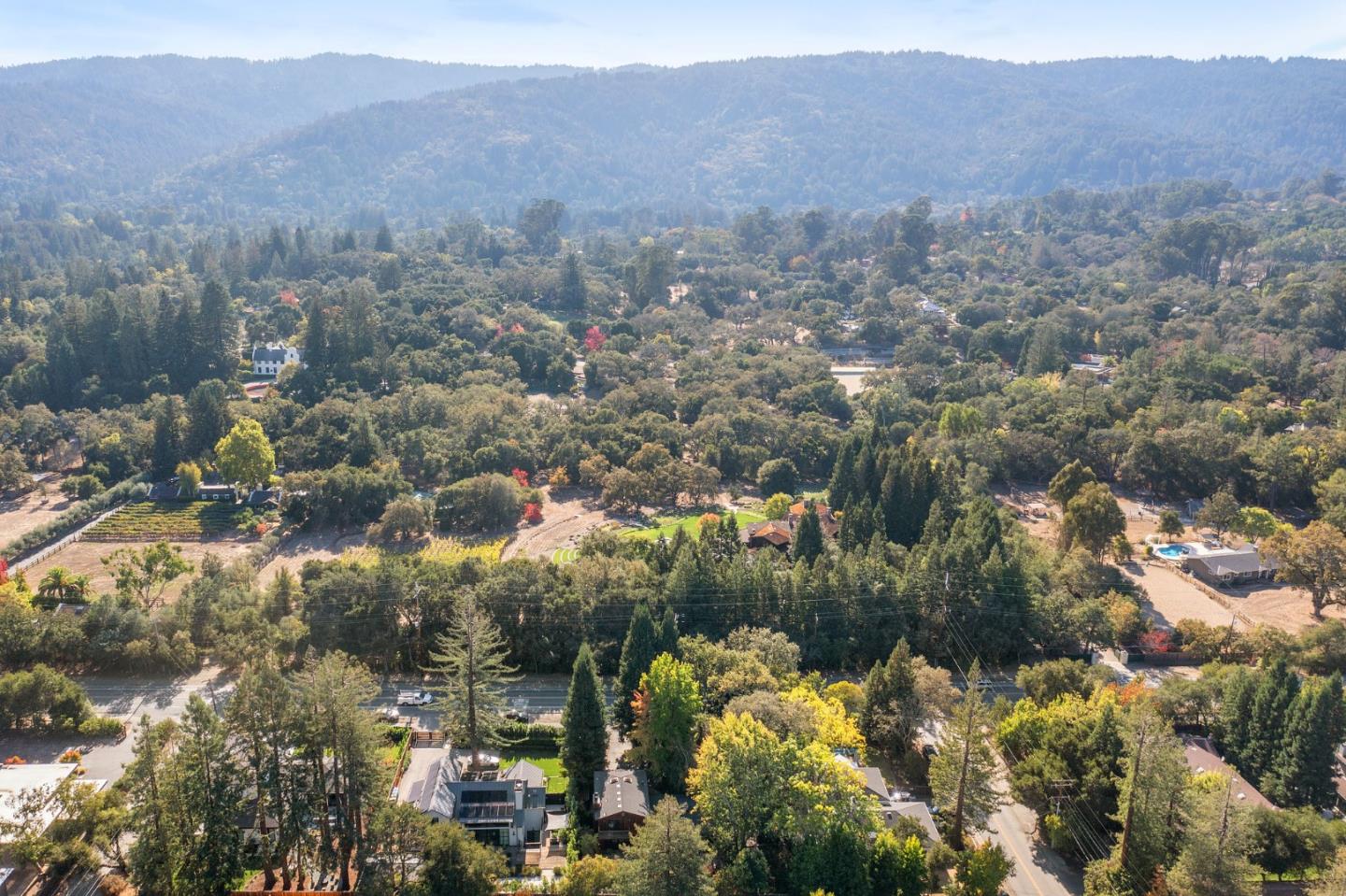 1275 Cañada Road Woodside, CA 94062 - Photo 62 of 62 a view of a house with a street