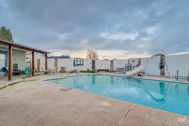 a view of a kitchen with a stove and a sink