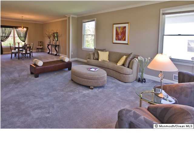 445 Iron Bridge Road Freehold, NJ 07728 - Photo 4 of 19 a living room with furniture and a window