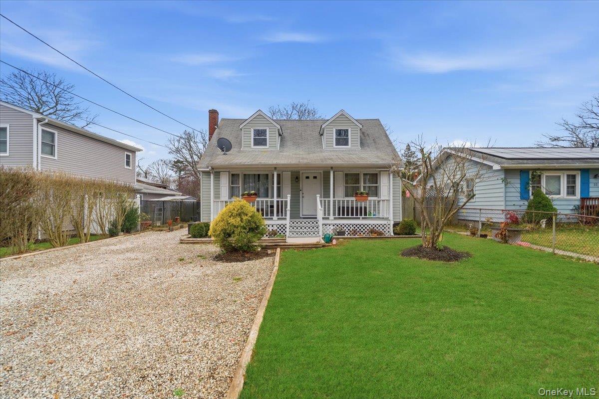 30 George Drive Mastic, NY 11950 - Photo 2 of 26 a view of a house with a backyard