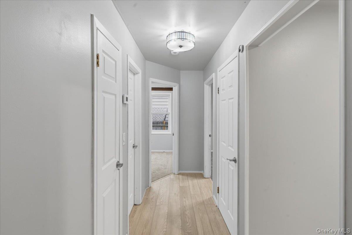 30 George Drive Mastic, NY 11950 - Photo 8 of 26 a view of a hallway
