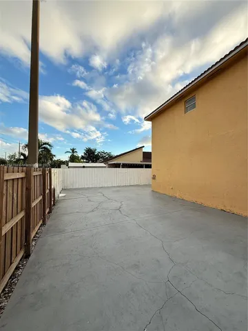 wooden floor in front of building