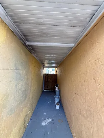 a view of hallway with stairs