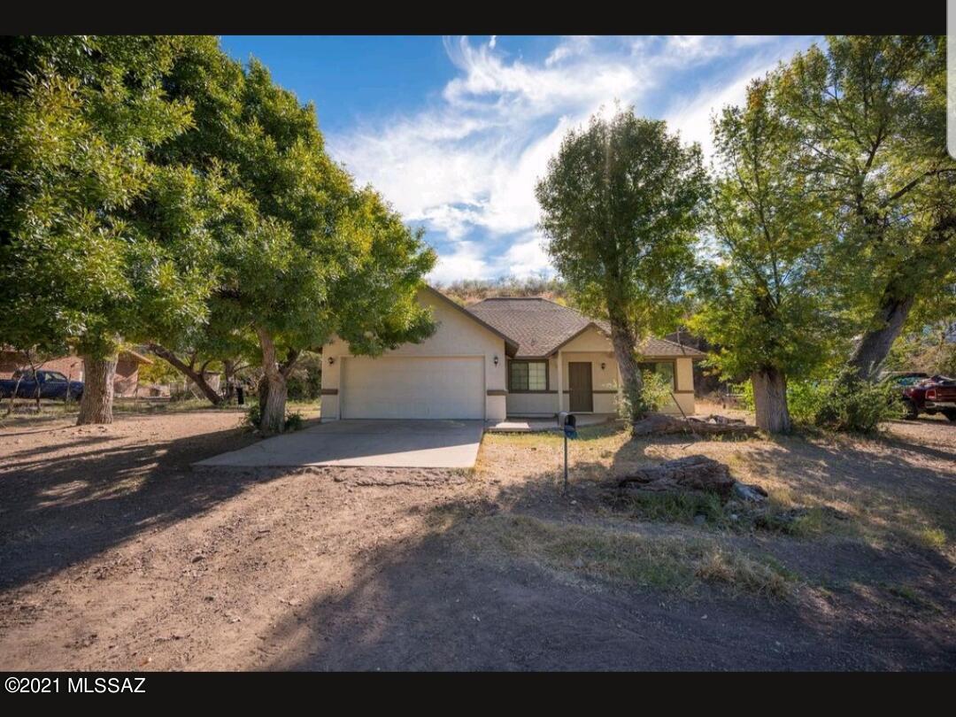 1375 Pendleton Drive Rio Rico, AZ 85648 - Photo 4 of 25 a view of a house with a yard