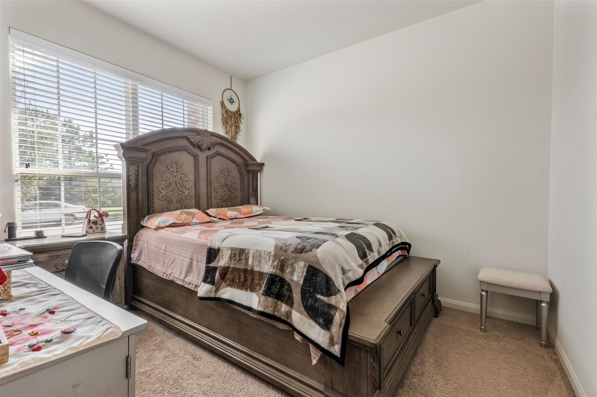22907 Gentle Shadow Drive Hockley, TX 77447 - Photo 16 of 27 a bedroom with a bed and window