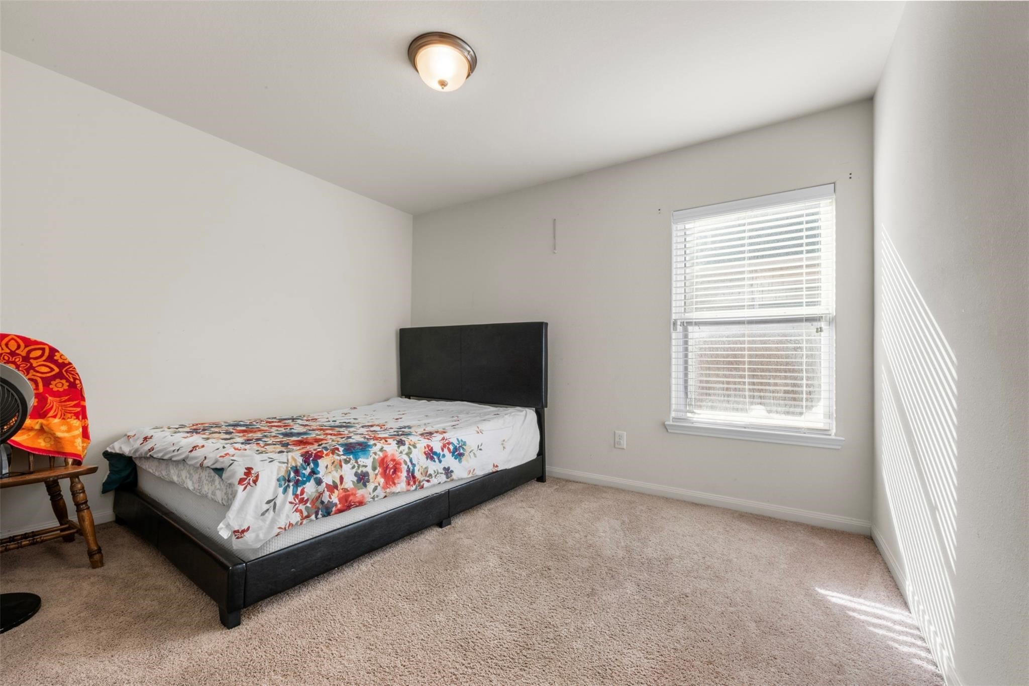 22907 Gentle Shadow Drive Hockley, TX 77447 - Photo 18 of 27 Sizable third bedrooms offering flexibility for family, guests, or a home office, each with ample natural light.