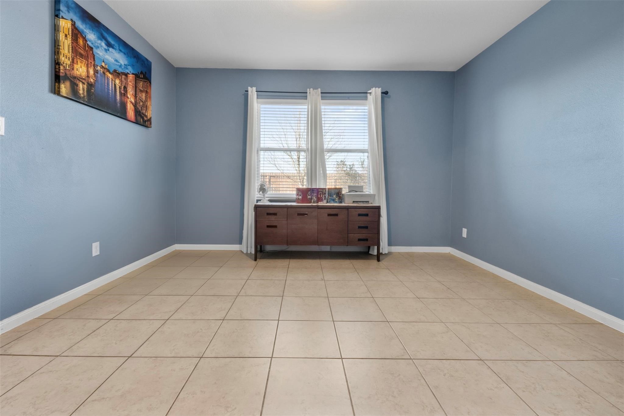 22907 Gentle Shadow Drive Hockley, TX 77447 - Photo 19 of 27 a view of an empty room with a window