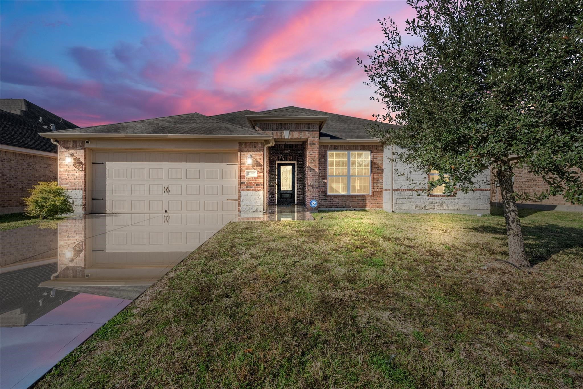 22907 Gentle Shadow Drive Hockley, TX 77447 - Photo 2 of 27 a front view of a house with a yard