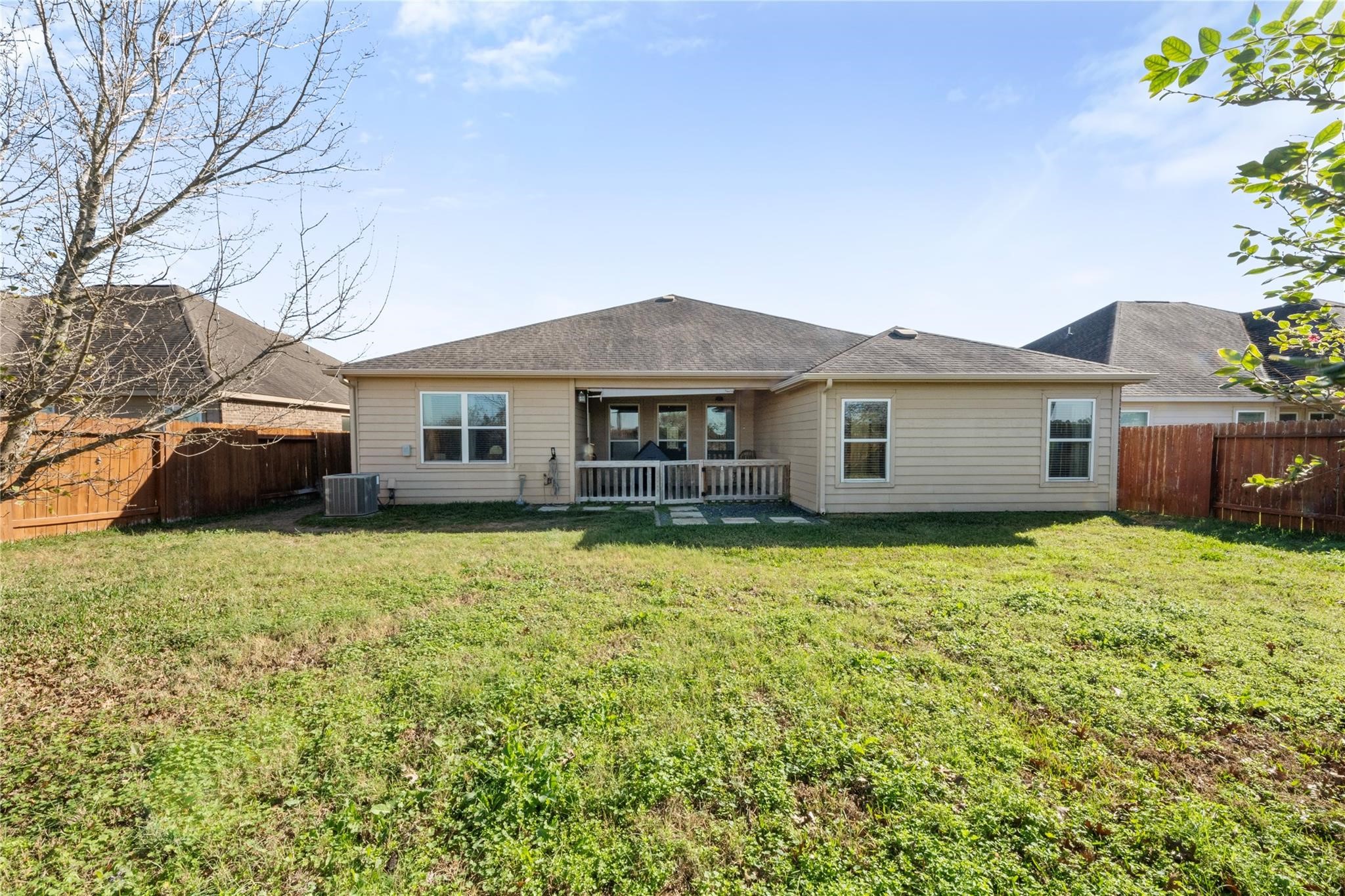 22907 Gentle Shadow Drive Hockley, TX 77447 - Photo 22 of 27 Spacious backyard with room for outdoor activities, relaxation, or future customization, ideal for enjoying Texas outdoor living.
