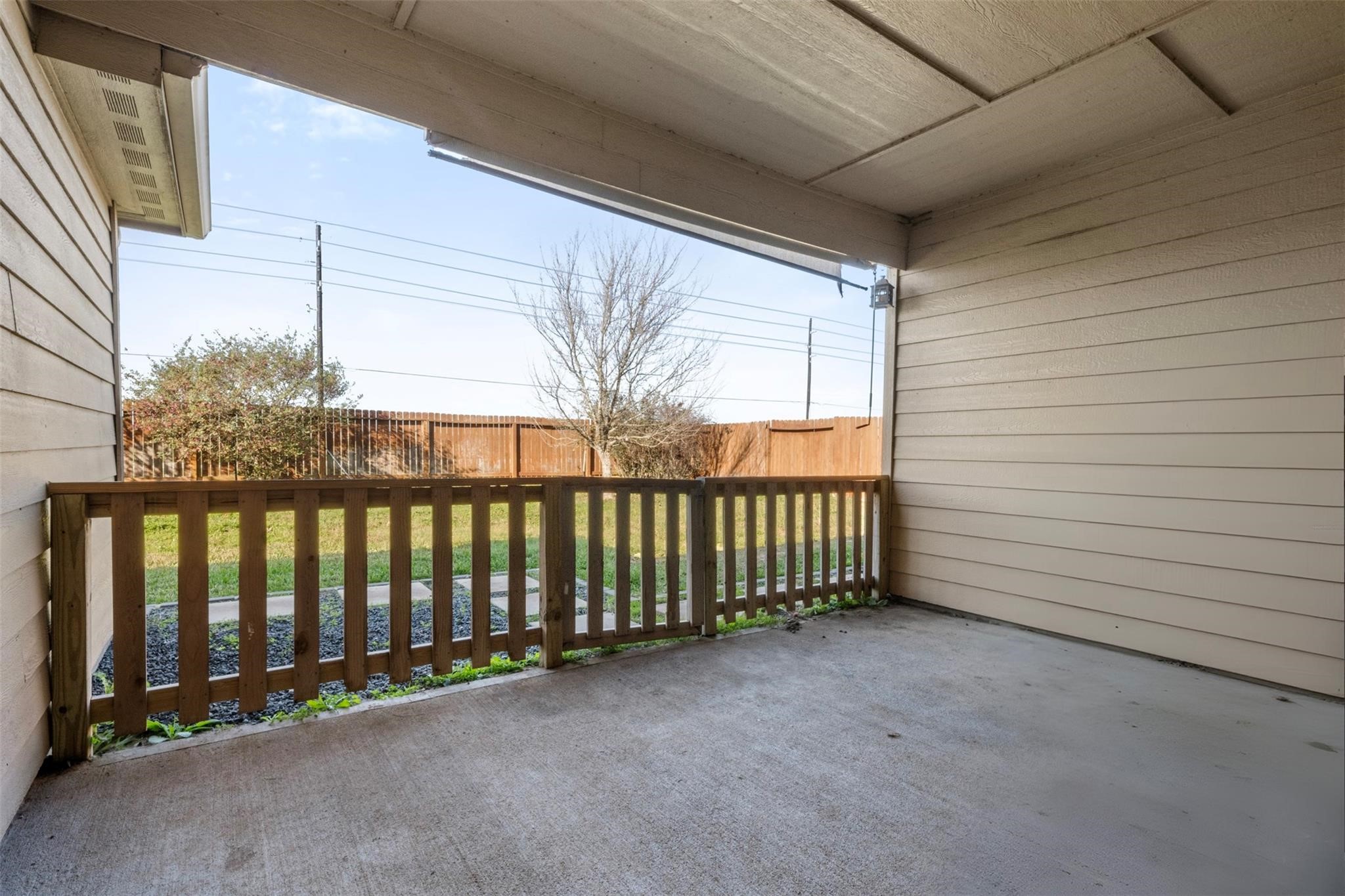 22907 Gentle Shadow Drive Hockley, TX 77447 - Photo 23 of 27 Spacious backyard with room for outdoor activities, relaxation, or future customization, ideal for enjoying Texas outdoor living.