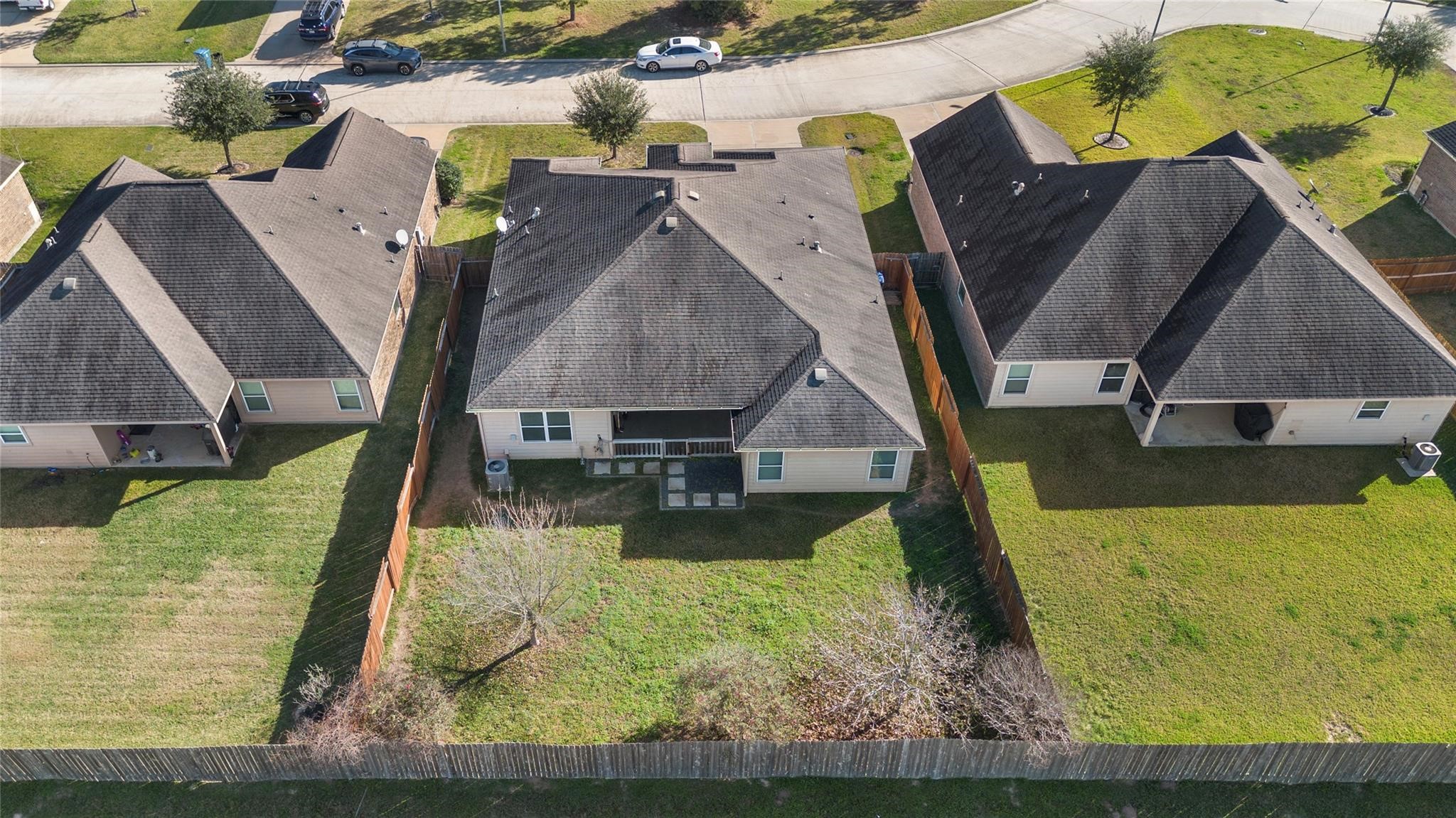 22907 Gentle Shadow Drive Hockley, TX 77447 - Photo 25 of 27 an aerial view of a house with swimming pool