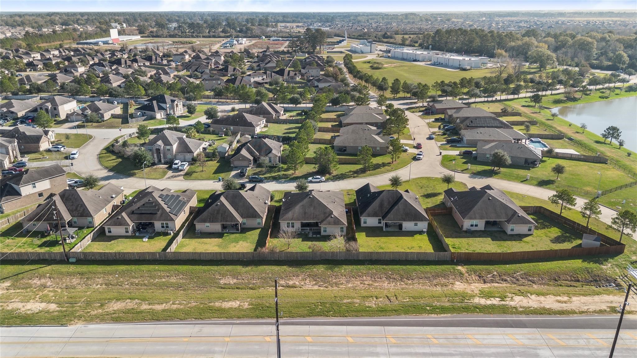 22907 Gentle Shadow Drive Hockley, TX 77447 - Photo 26 of 27 an aerial view of residential houses with outdoor space