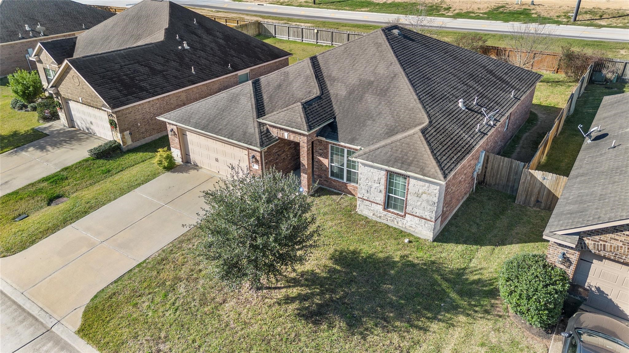 22907 Gentle Shadow Drive Hockley, TX 77447 - Photo 27 of 27 a view of a house with a backyard