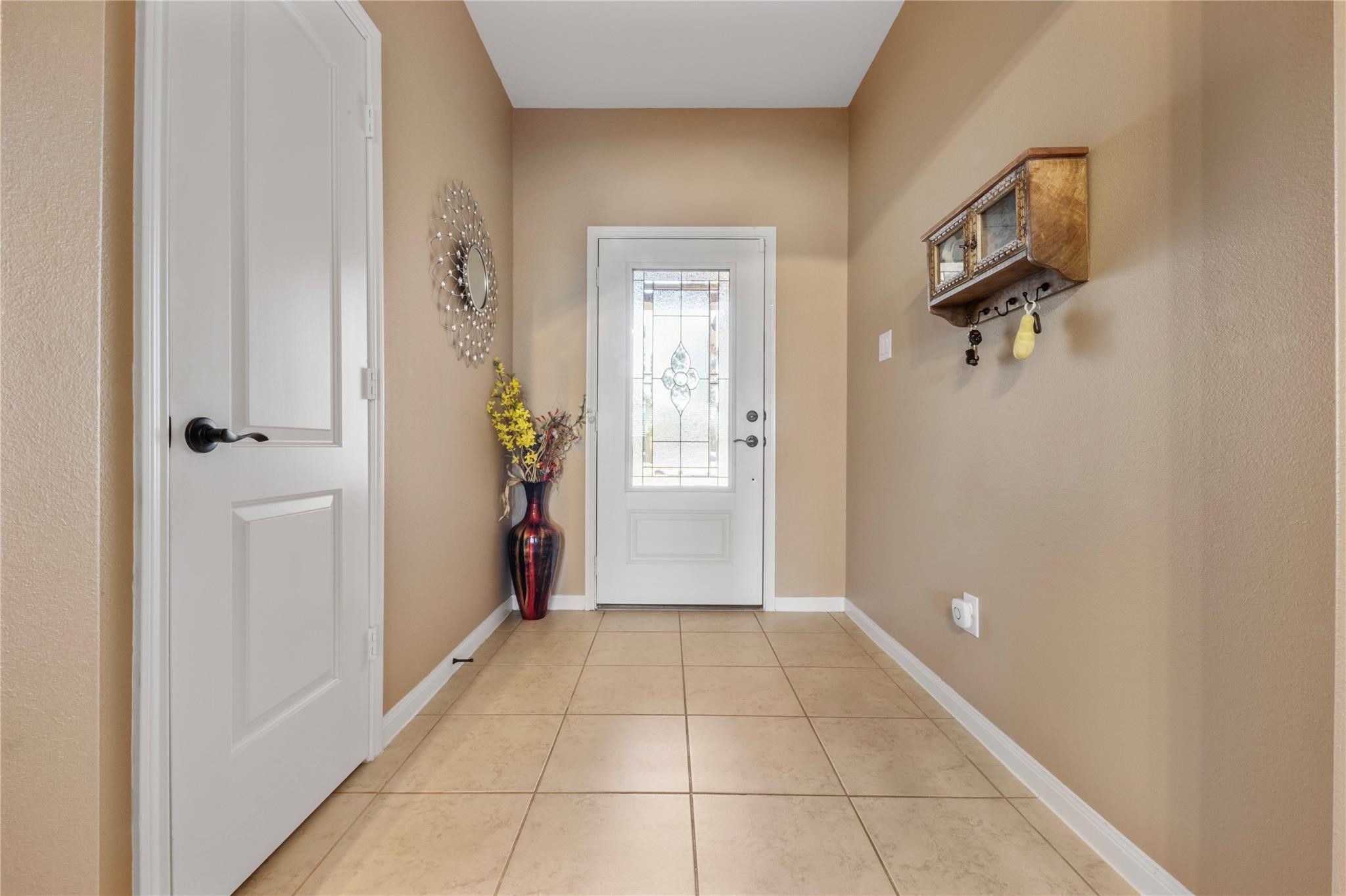 22907 Gentle Shadow Drive Hockley, TX 77447 - Photo 5 of 27 a view of a hallway to rooms and stairs