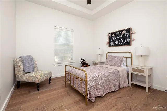 a bedroom with a bed and a couch